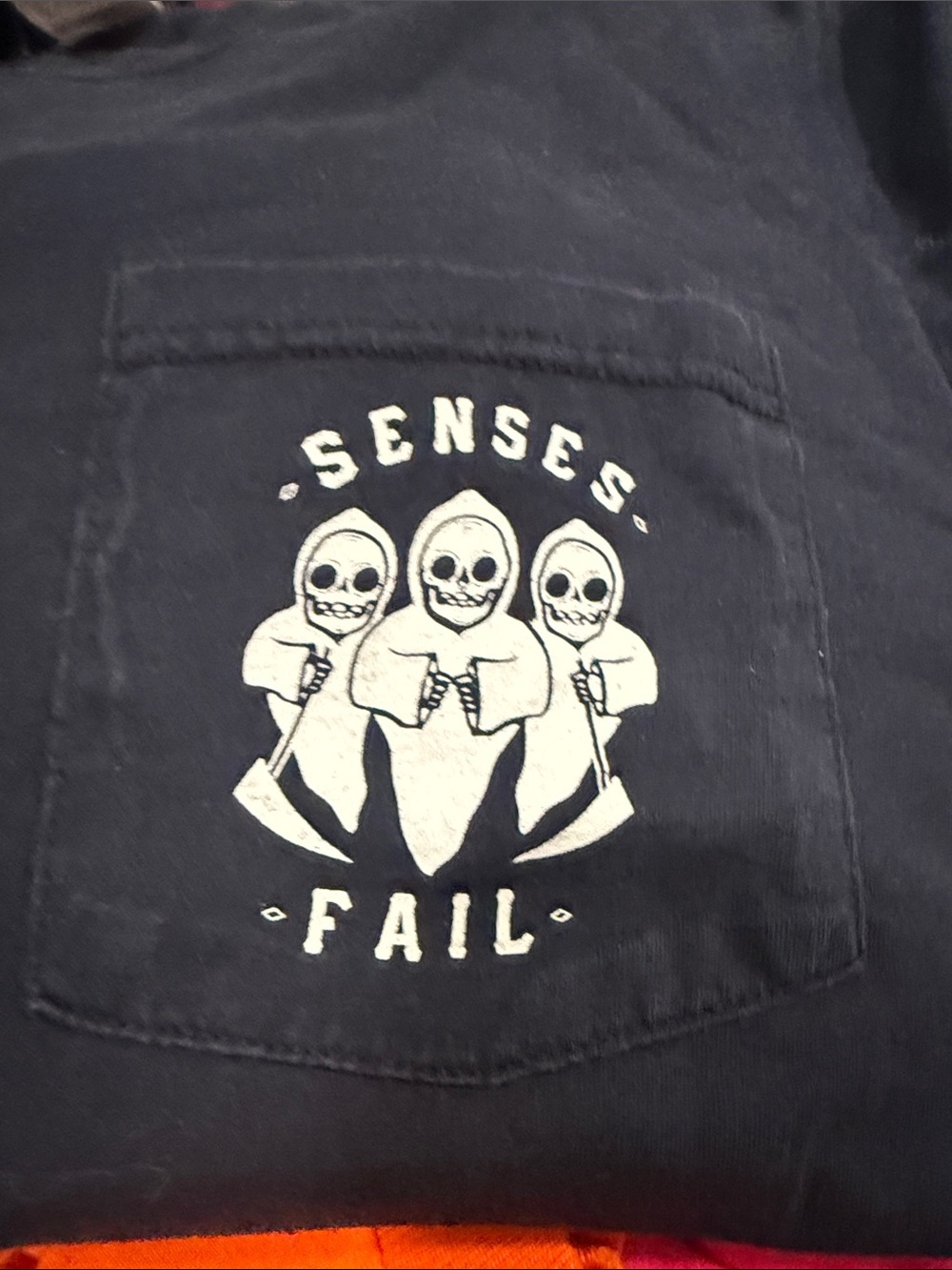 Black Graphic Pocket Tee with White 'Senses Fail' Skull Design